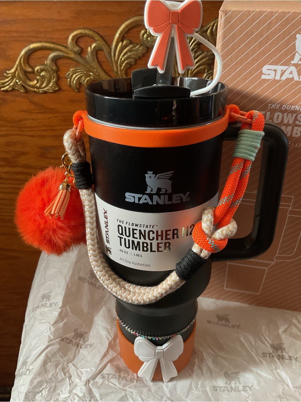 Stanley Black and Orange Quencher Tumbler with Decorative Strap